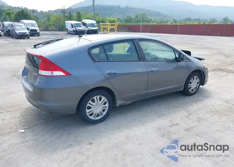 2010 Honda Insight Lx z USA, uszkodzony, nr VIN JHMZE2H58AS019727
